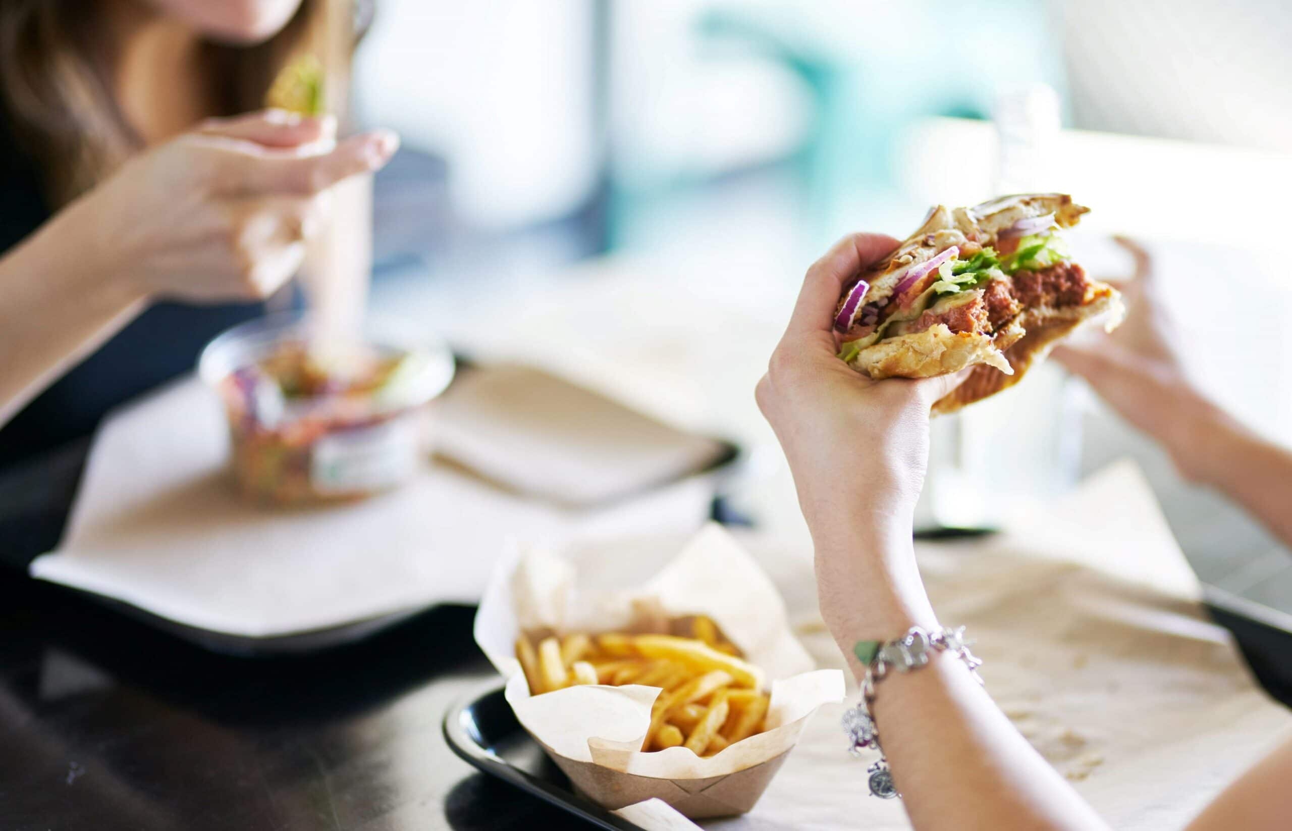 eating a delicious burger